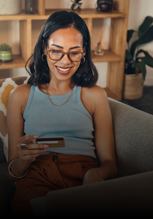 A woman entering credit card data