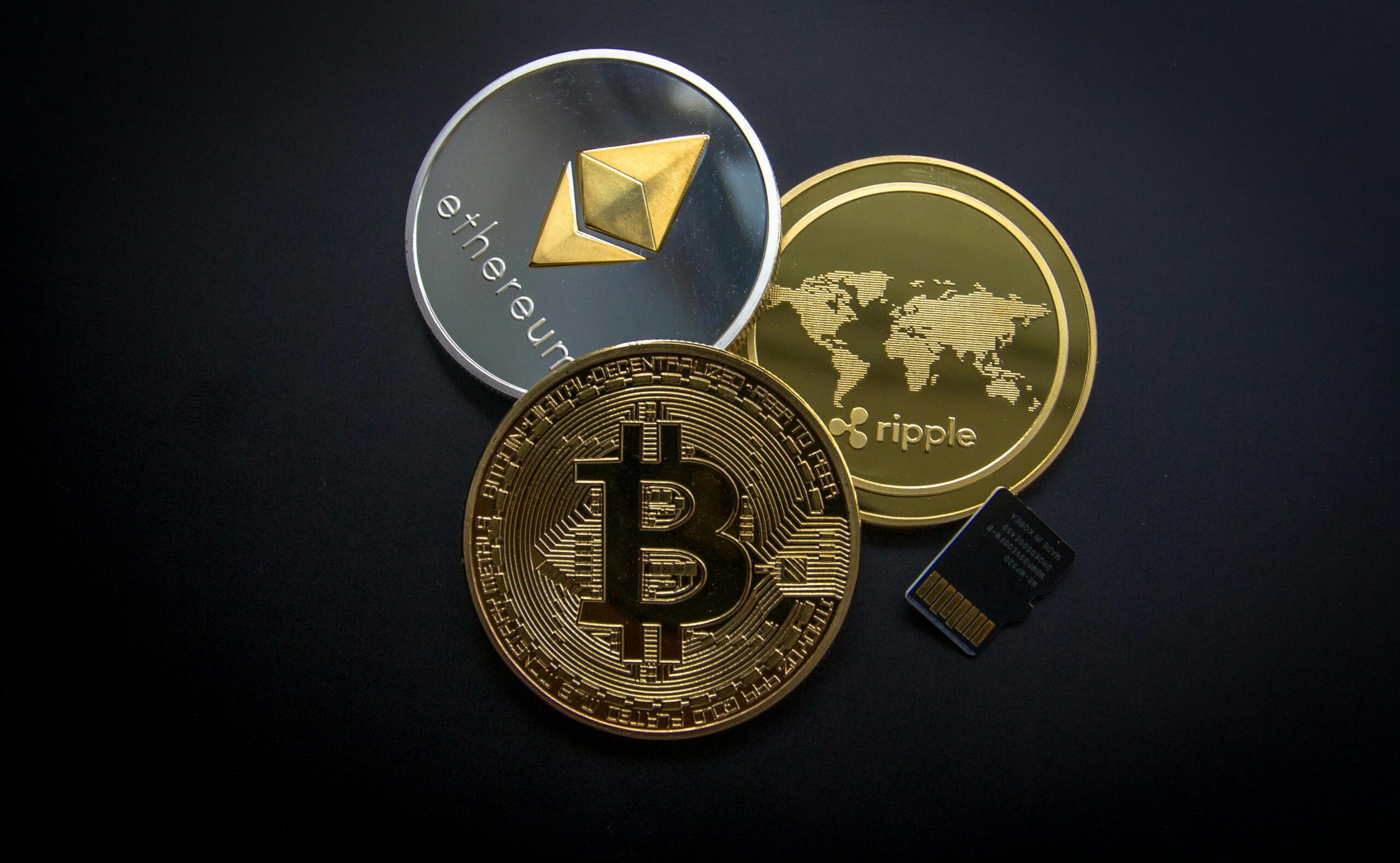 Bitcoin, Ethereum, and Ripple on the Table